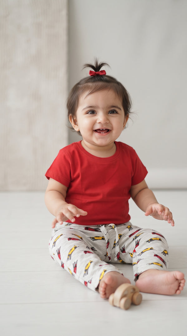 Baby wearing the Red T-Shirt and Race Car Pants Set