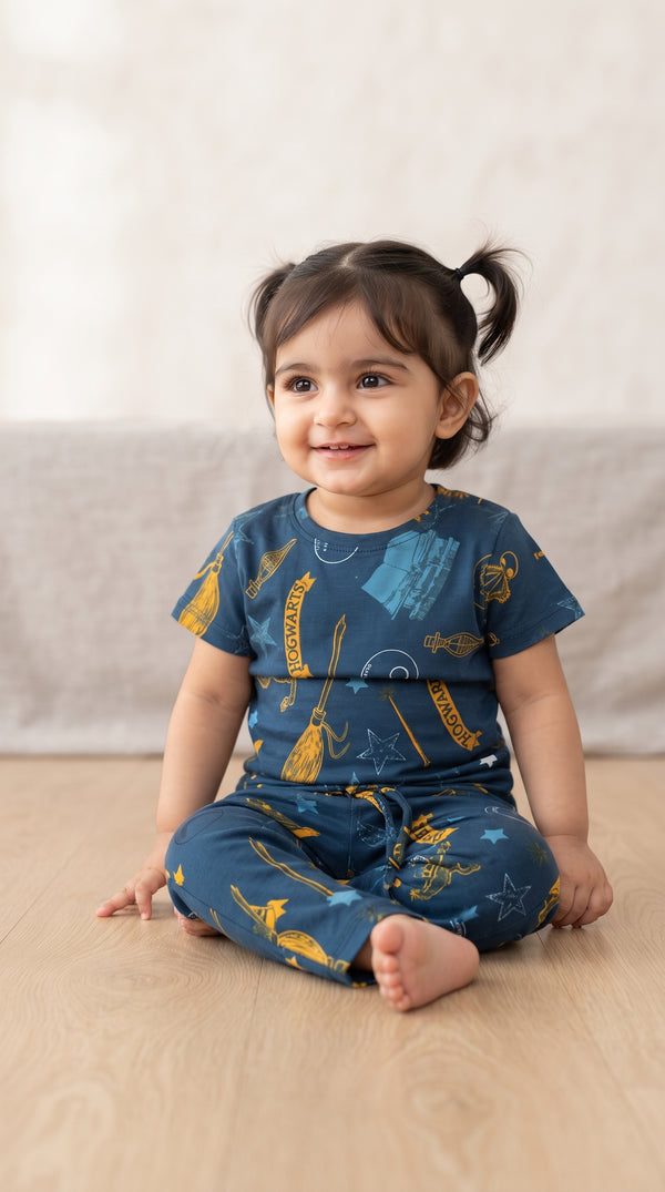 Baby wearing the Teal Wizard Print T-Shirt and Pants Set