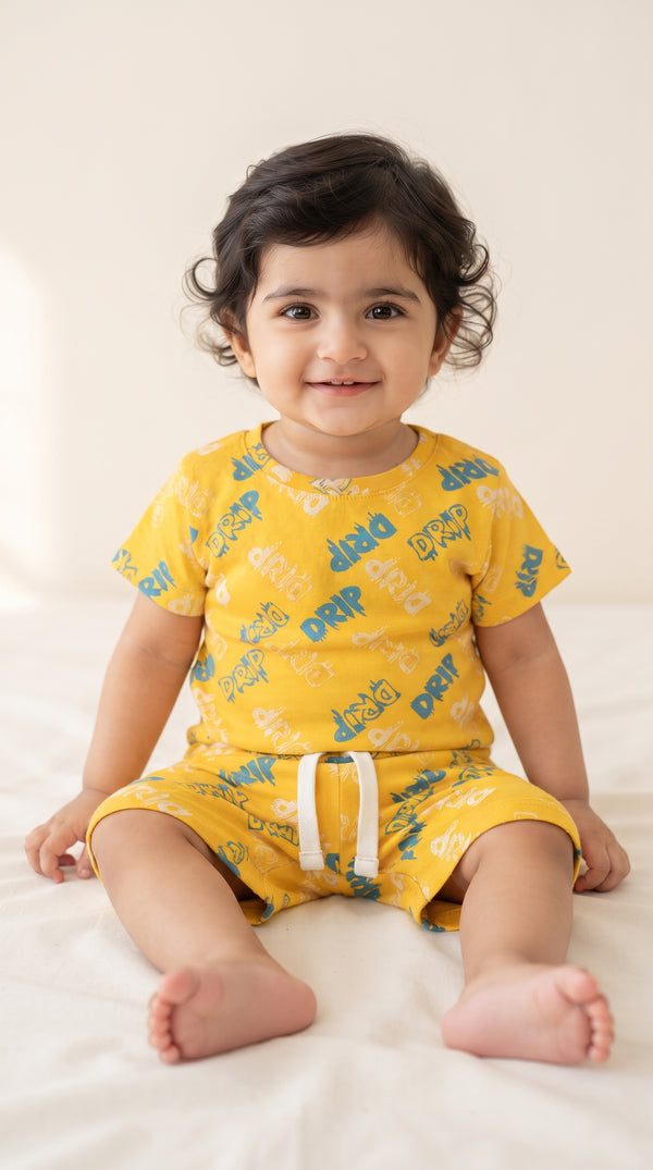 Baby wearing the Yellow Drip Graffiti T-Shirt and Shorts Set