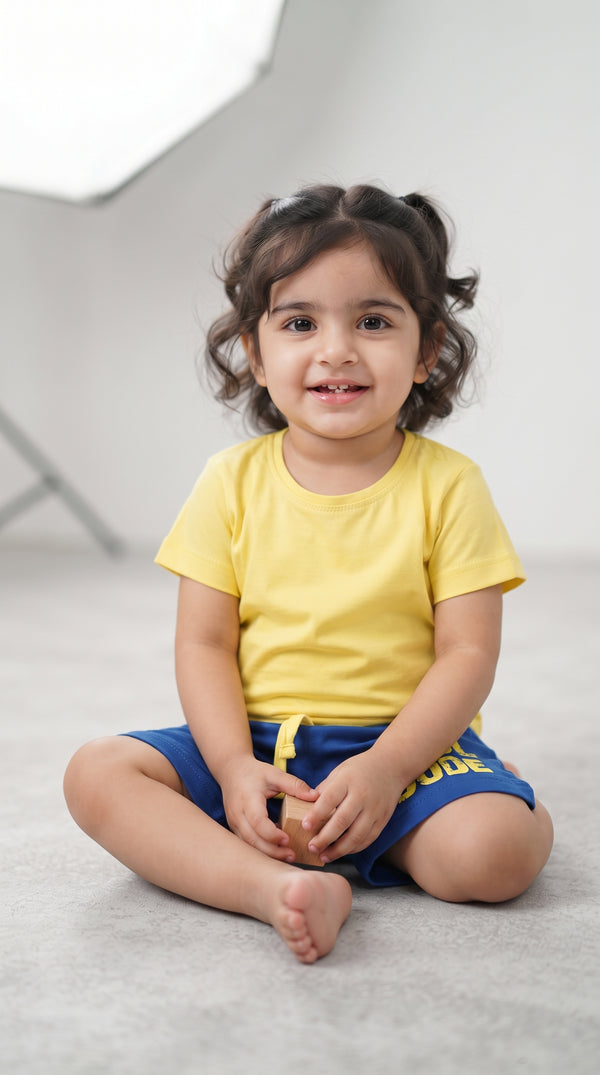 Baby wearing the Kids Yellow T-Shirt and Blue Cool Dude Shorts Set