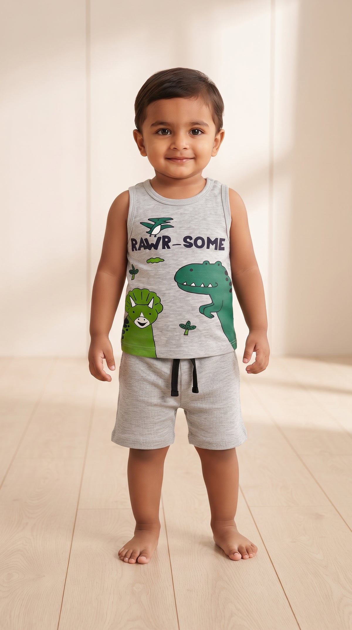 Baby wearing the Grey Rawr-Some Dinosaur Tank and Shorts Set