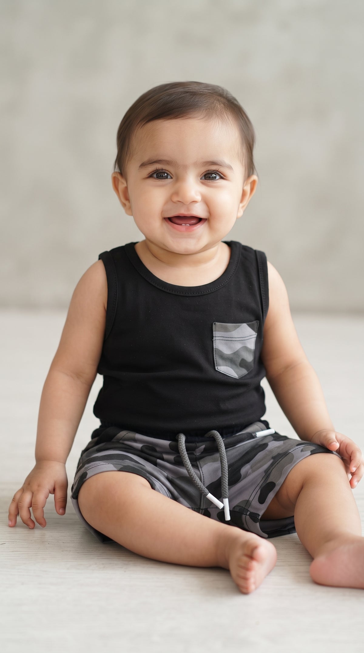 Baby wearing the Black Tank Top and Grey Camo Shorts Set