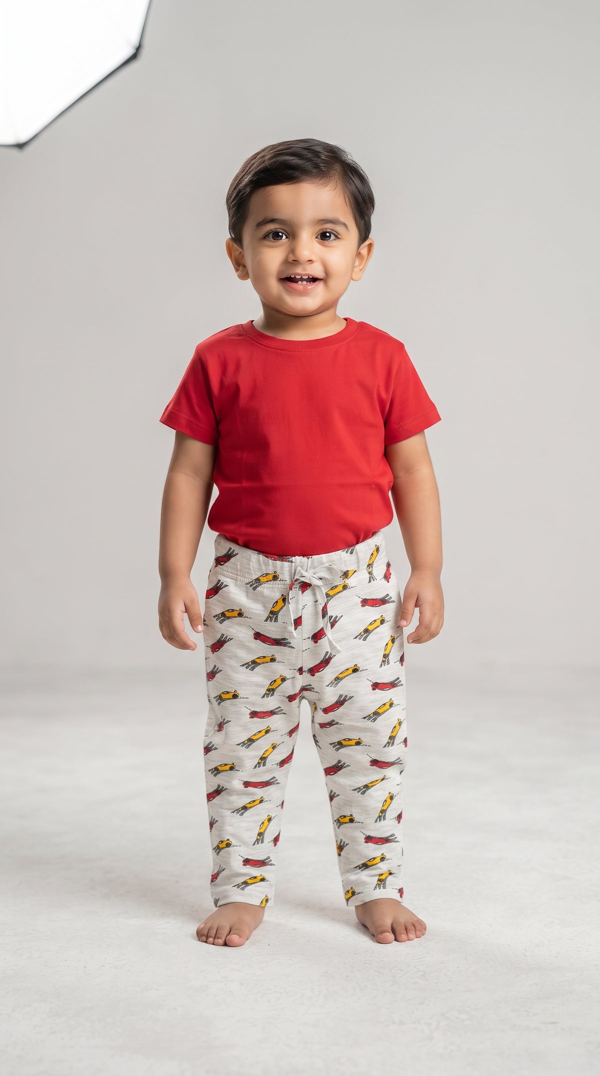 Baby wearing the Red T-Shirt and Race Car Pants Set