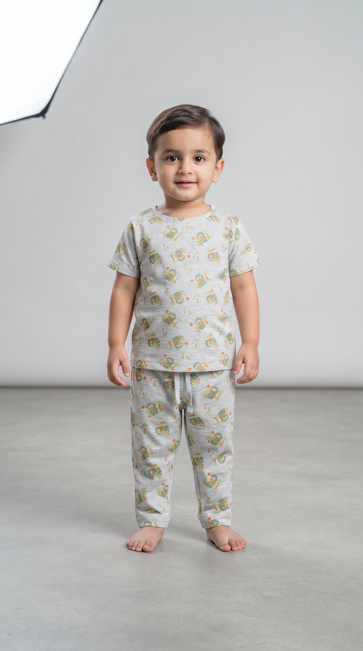 Baby wearing the Kids Light Grey Jungle Print T-Shirt and Pants Set